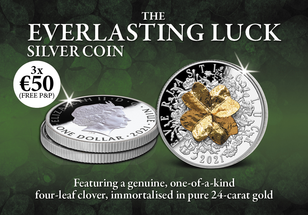 Genuine natural 4 leaf clover hand-set on a coin struck in finest silver