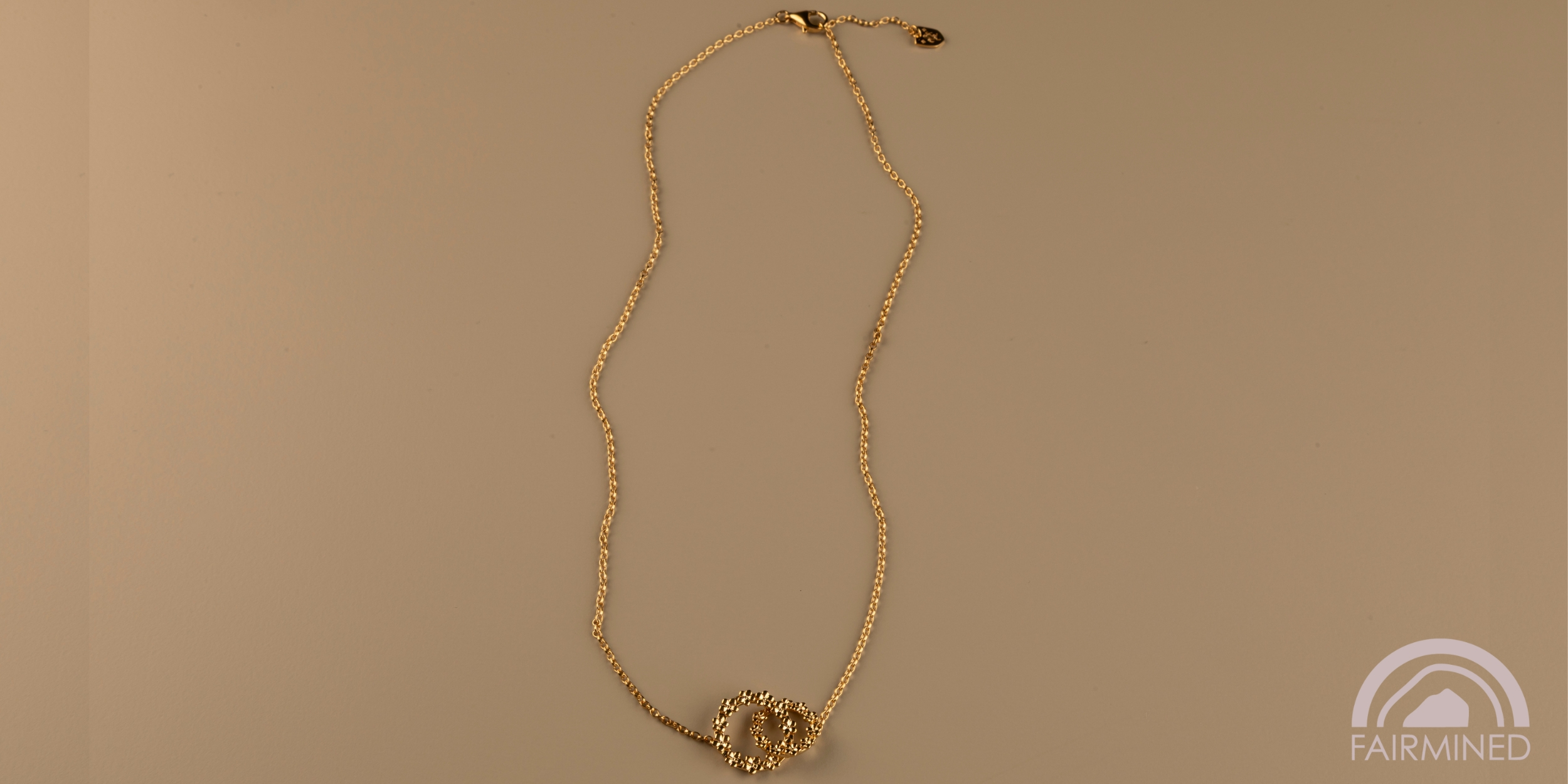 The Forget-Me-Not 'Wreath' Silver Love Link Necklace layered in 18-carat Fairmined Gold
