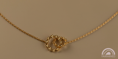 The Forget-Me-Not 'Wreath' Silver Love Link Necklace layered in 18-carat Fairmined Gold